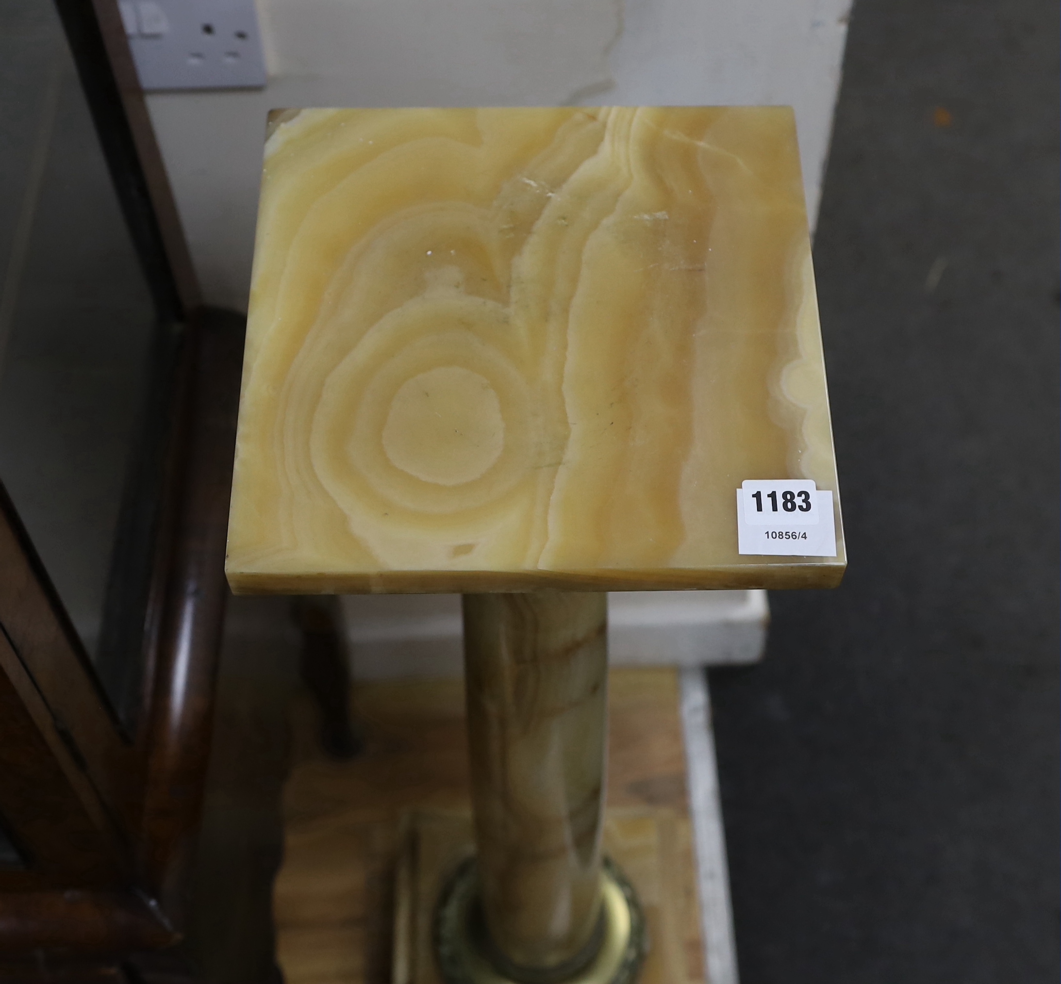 A gilt metal mounted and onyx pedestal, width 25cm, height 103cm